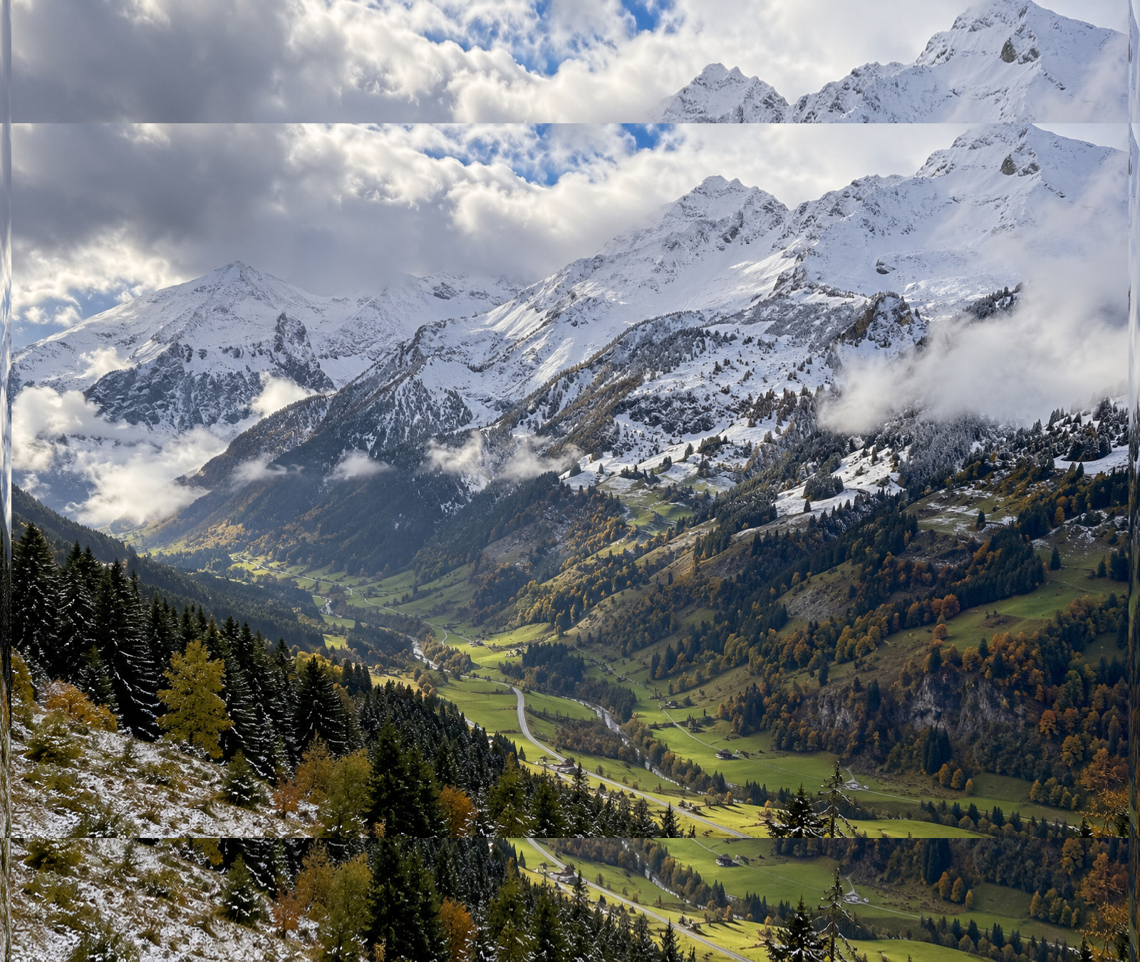 Alpental mit grünen Tallagen und deutlich sichtbarer Schneegrenze an den Berghängen
